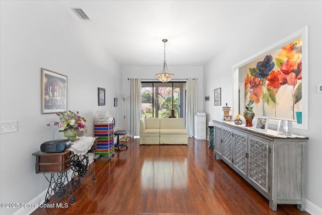 foyer entrance with dark hardwood / wood-style flooring