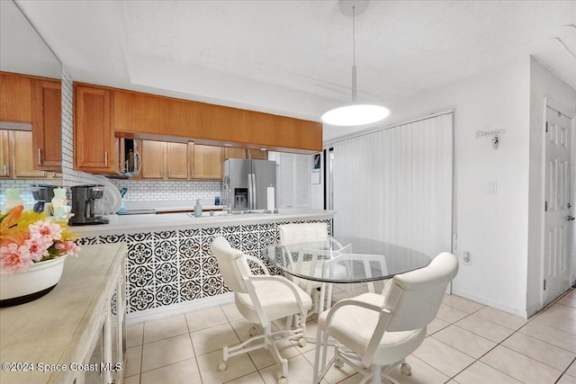 view of tiled dining area