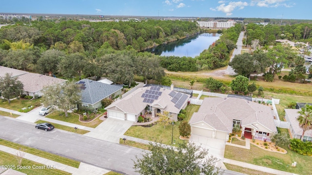 bird's eye view with a water view