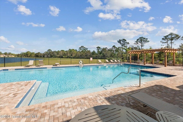 view of pool featuring a pergola and a patio area