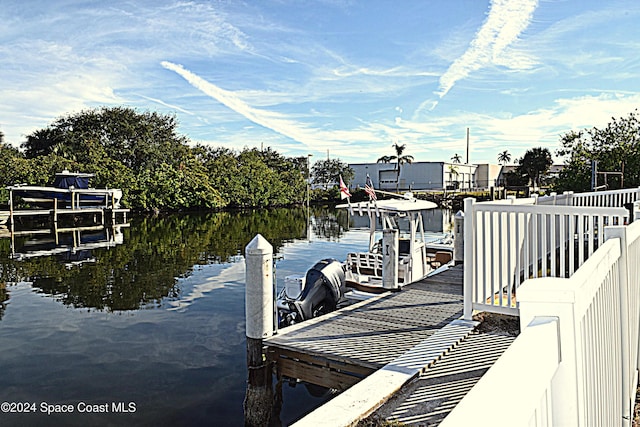 view of dock with a water view