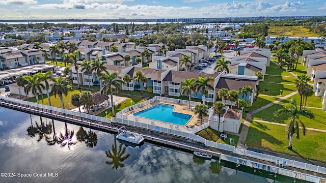 birds eye view of property featuring a water view