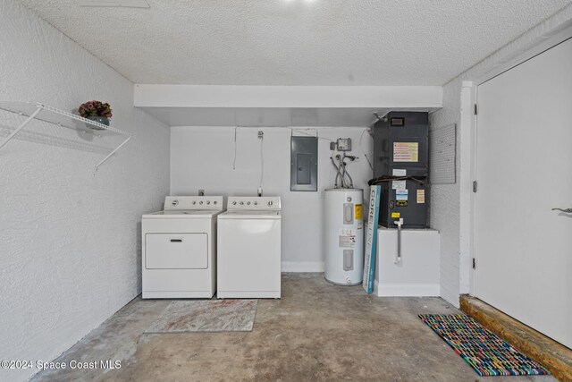 clothes washing area featuring water heater, independent washer and dryer, electric panel, heating unit, and a textured ceiling