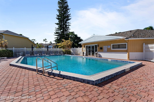 view of pool featuring a patio