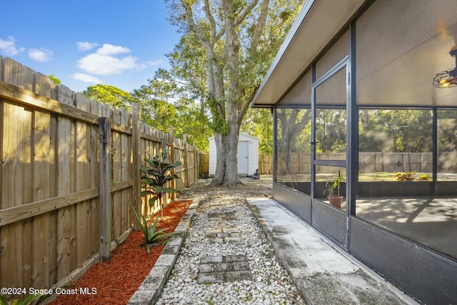 exterior space featuring a shed