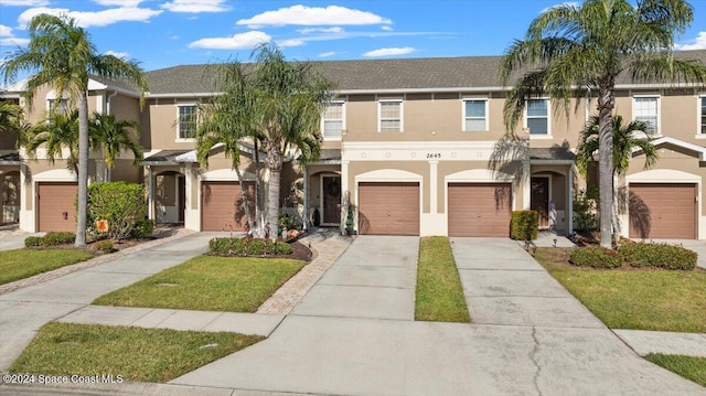 view of property with a garage