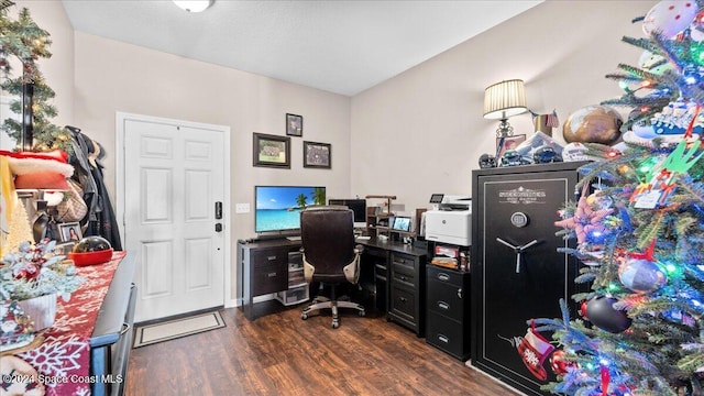 home office with dark wood-type flooring