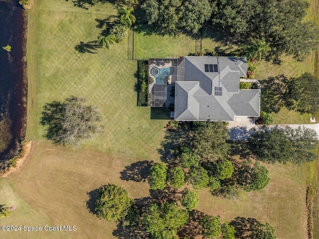 birds eye view of property with a rural view