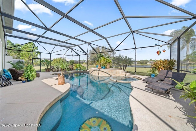 view of swimming pool with a lanai, an in ground hot tub, and a patio