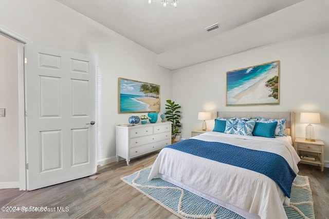 bedroom featuring light hardwood / wood-style floors