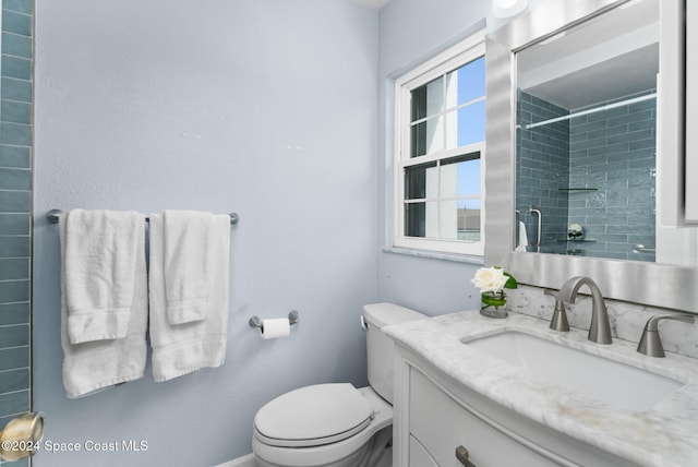 737 Palm Springs Cir, Indian Harbour Beach, FL 32937 - bathroom with vanity and a tile shower