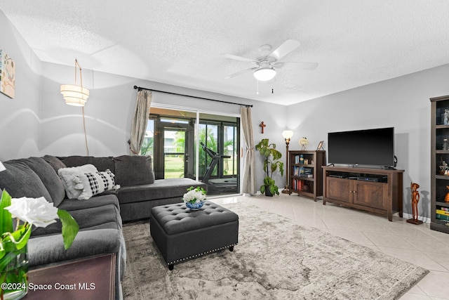 737 Palm Springs Cir, Indian Harbour Beach, FL 32937 - tiled living area featuring a textured ceiling and ceiling fan
