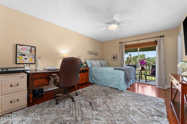 737 Palm Springs Cir, Indian Harbour Beach, FL 32937 - bedroom featuring access to outside, wood finished floors, a textured ceiling, a ceiling fan, and an office area