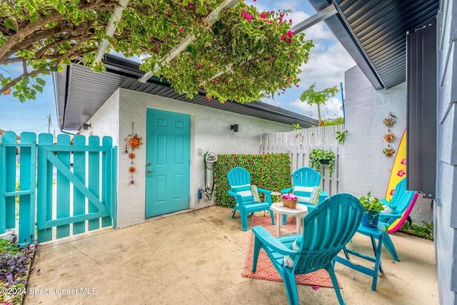 737 Palm Springs Cir, Indian Harbour Beach, FL 32937 - view of patio / terrace featuring a gate