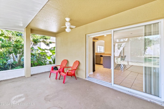 view of patio with ceiling fan