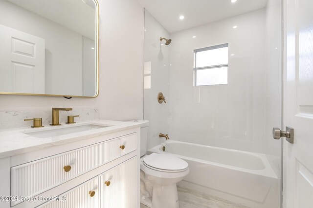 full bathroom with vanity, shower / bathing tub combination, and toilet