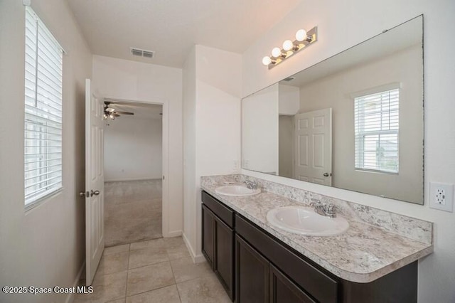 bathroom featuring tile patterned floors and vanity