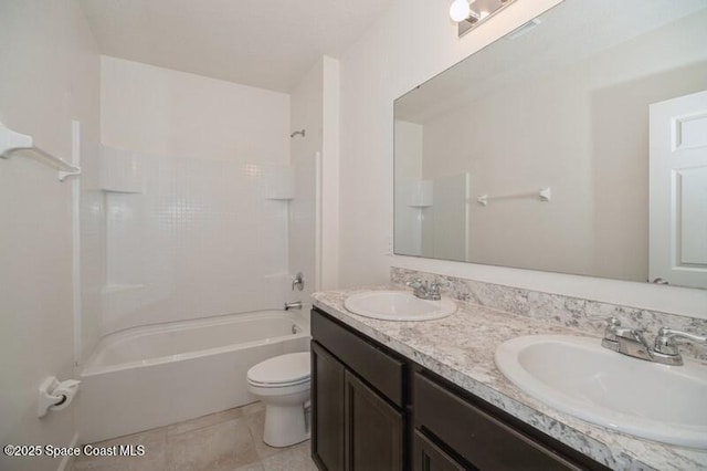 full bathroom with toilet, tile patterned floors, washtub / shower combination, and vanity