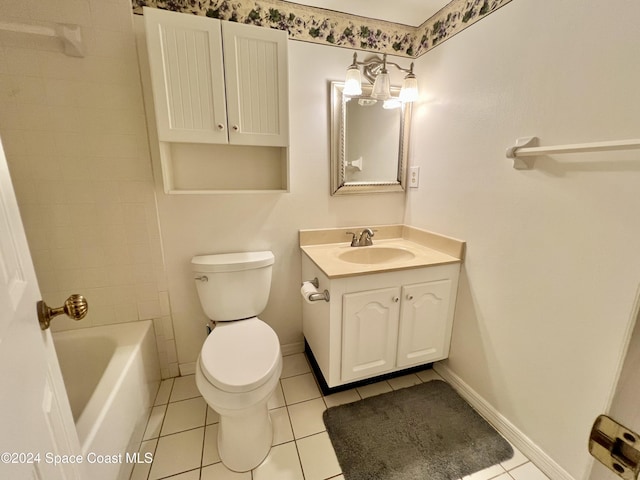 bathroom featuring tile patterned flooring, vanity, and toilet