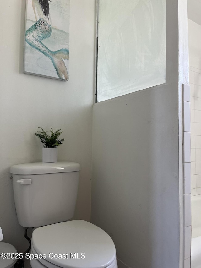 bathroom featuring toilet