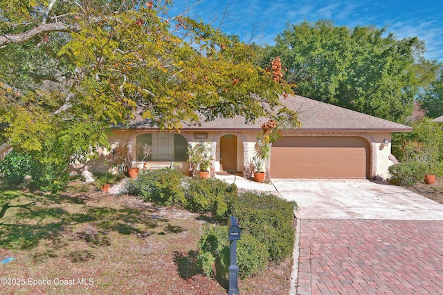 view of front of home with a garage