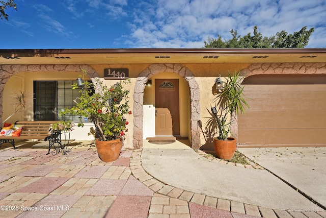 entrance to property with a garage