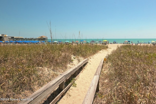 property view of water featuring a view of the beach