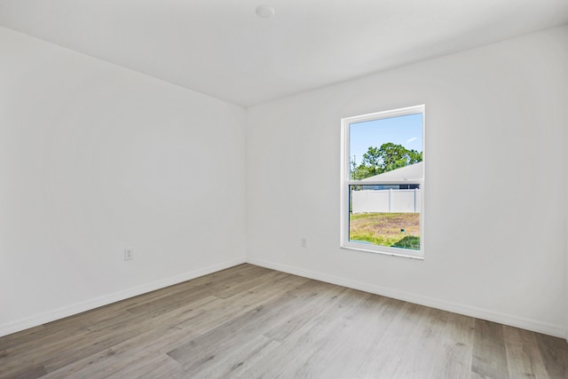 unfurnished room featuring light wood-type flooring