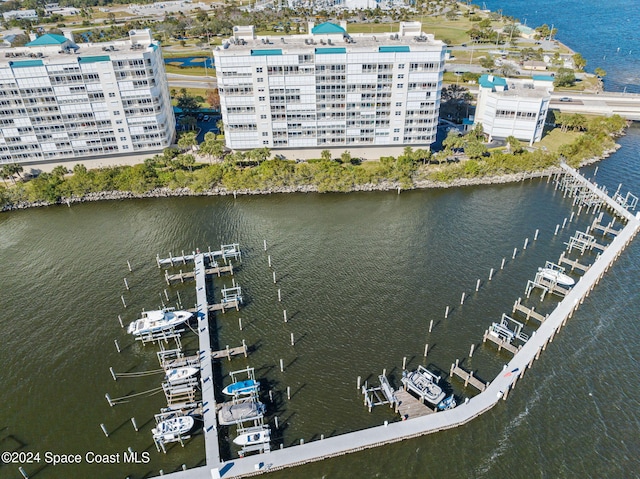 birds eye view of property featuring a water view