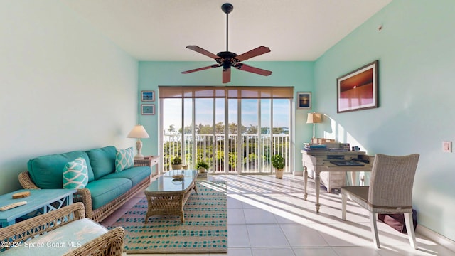 tiled living room with ceiling fan