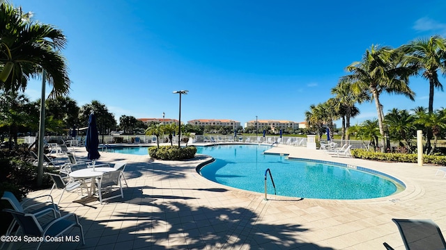 view of pool featuring a patio area