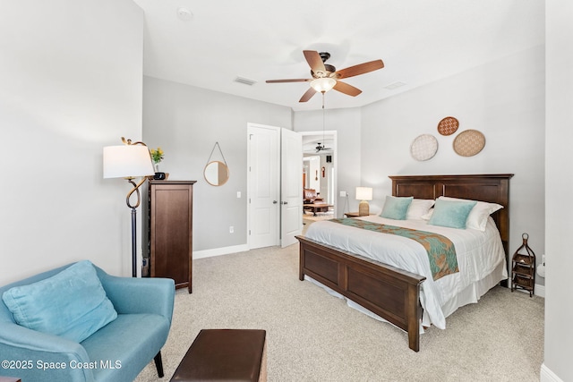 carpeted bedroom featuring ceiling fan