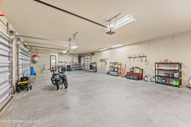 garage featuring a garage door opener