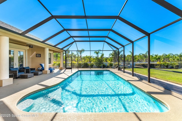 view of swimming pool with a lanai, an outdoor hangout area, and a patio