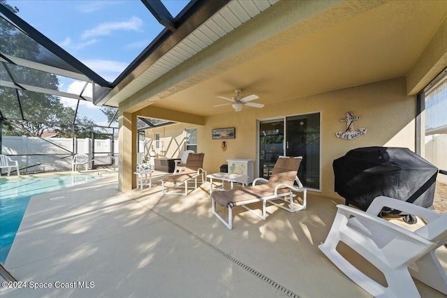 view of patio with ceiling fan, a grill, a fenced in pool, and glass enclosure