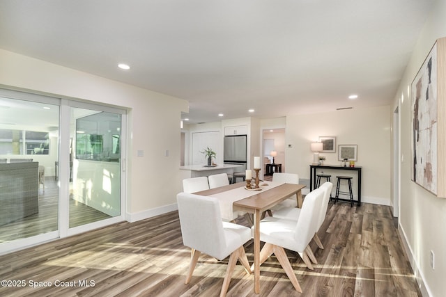 dining area featuring hardwood / wood-style floors