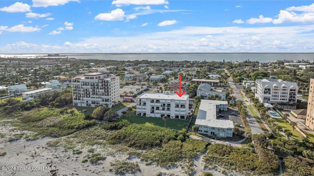 birds eye view of property featuring a water view