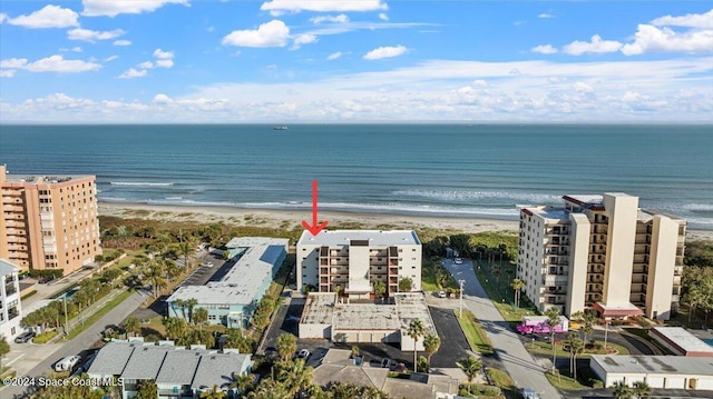 aerial view with a view of the beach and a water view