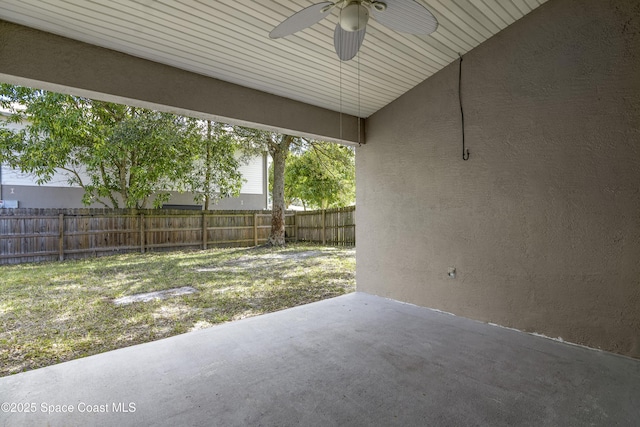 view of patio featuring ceiling fan