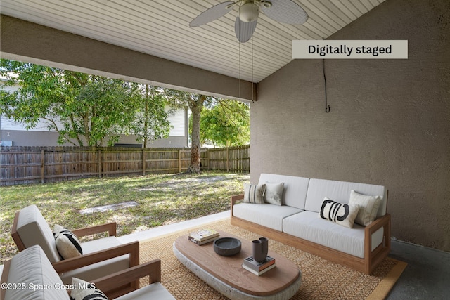 view of patio featuring ceiling fan and outdoor lounge area