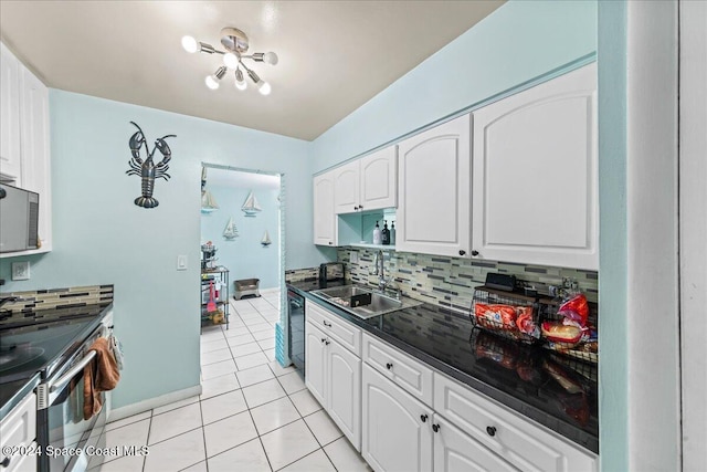 kitchen featuring white cabinets, tasteful backsplash, stainless steel appliances, and sink