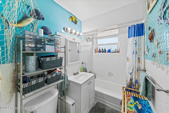 full bathroom with vanity, shower / bath combination with curtain, and toilet