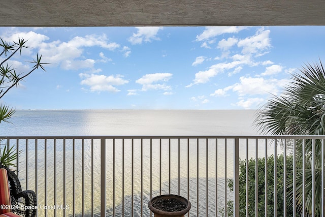 balcony featuring a water view