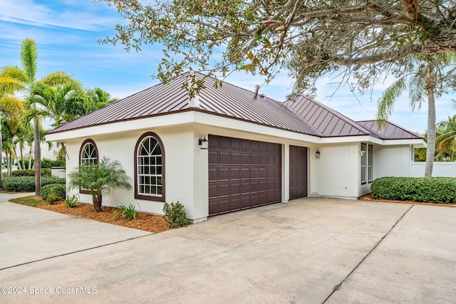 view of front of home featuring a garage