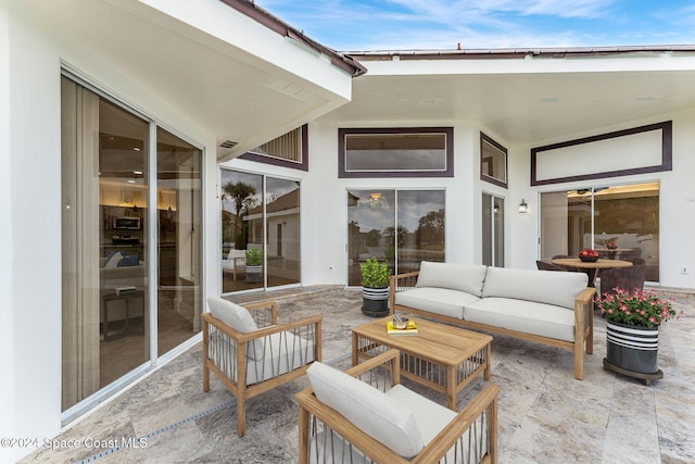 view of patio with an outdoor hangout area