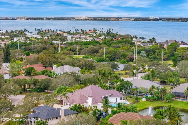 bird's eye view with a water view