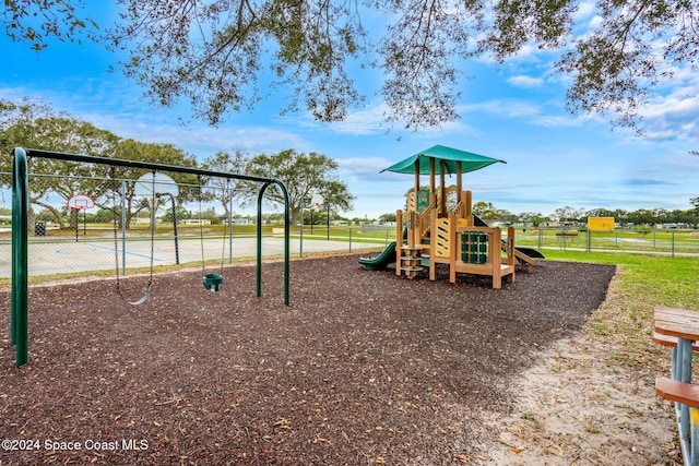 view of playground with basketball court