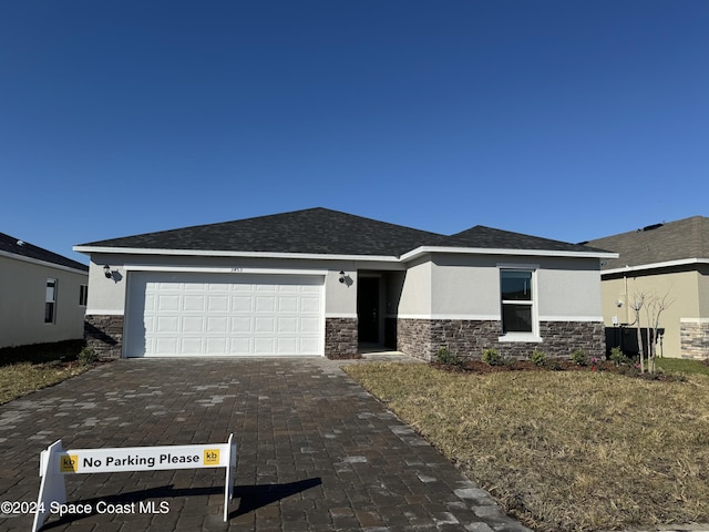 view of front of house with a garage