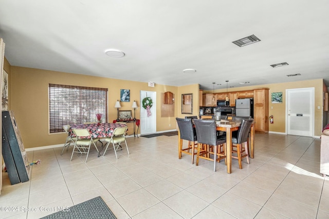 view of tiled dining room