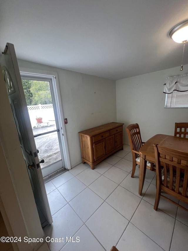 dining room featuring light tile patterned flooring